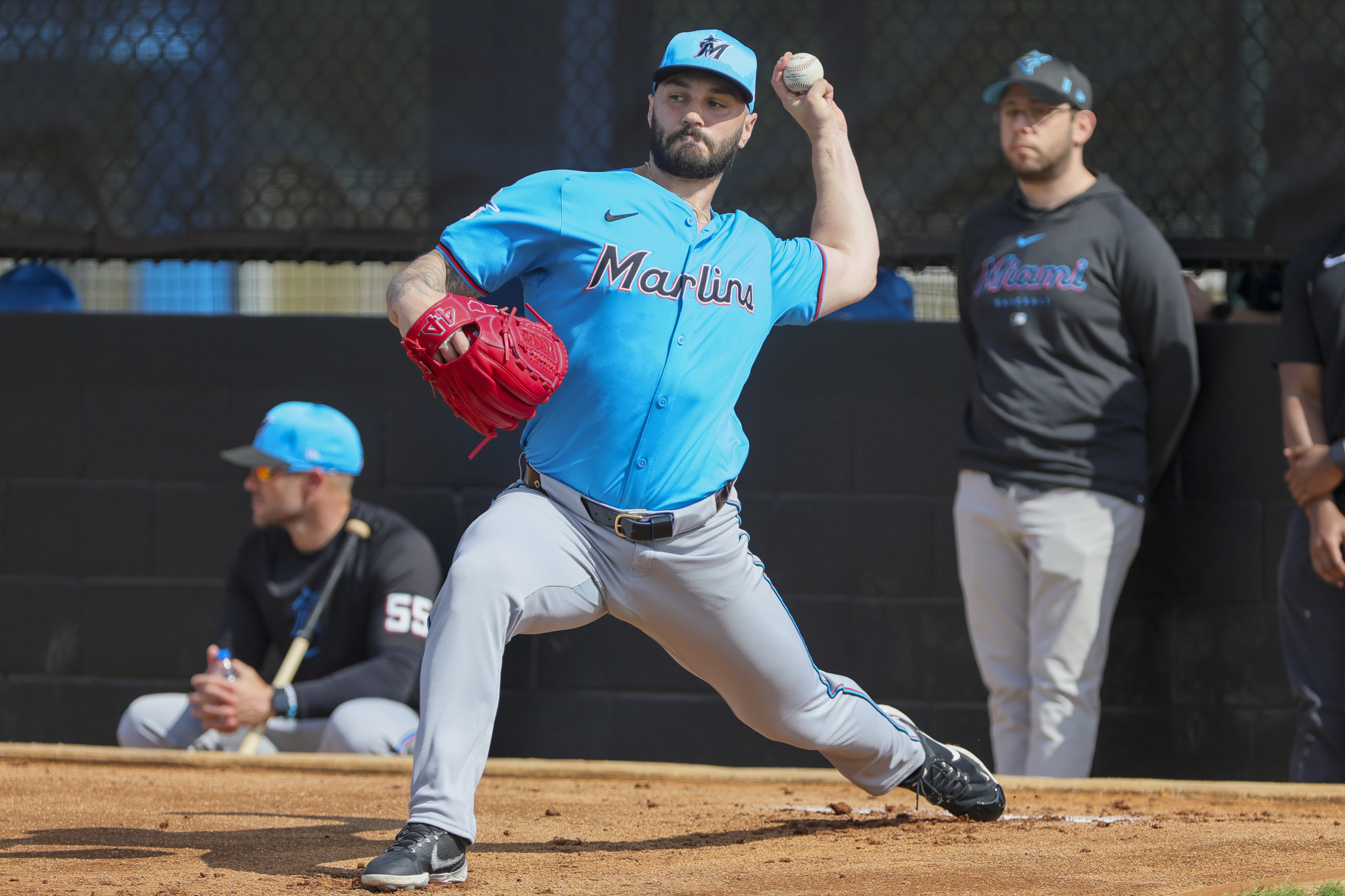 Feb 17, 2024; Jupiter, FL, USA; Miami Marlins relief pitcher Tanner Scott (66) delivers a pitch during a spring training workout at the Marlins Player Development & Scouting Complex.